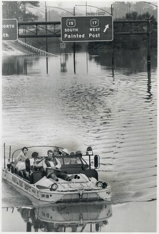 Rescue Teams Boating Through the Streets of Corning, Heading Towards Painted Post