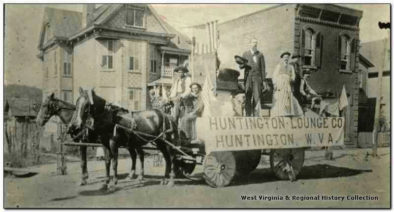 The brick Bank of Huntington is visible in the background of this photo