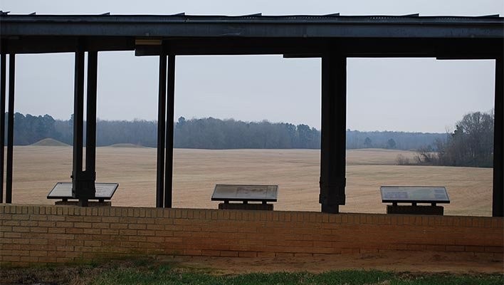 Interpretive signs that discuss the history of the mounds