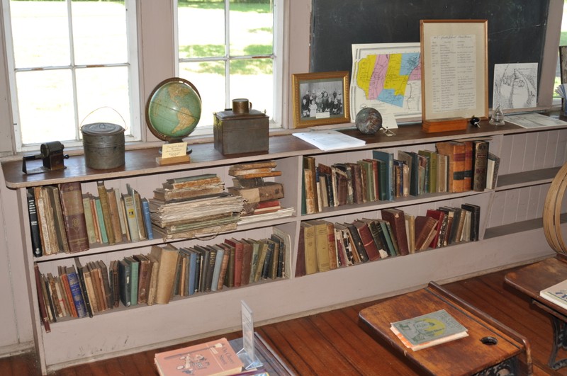 Interior bookcase with historic artifacts