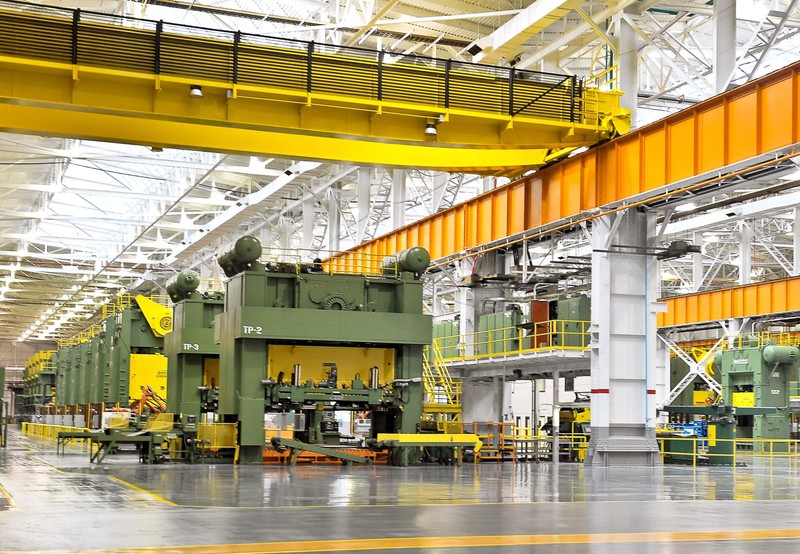 The modern-day auto parts stamping plant interior in a photo from 2012, shortly after Gestamp began leasing the original Machine Shop. The overhead crane, still in use, dates back to 1941, or may even be original to the NOP. Photo by Bob Wojcieszak.