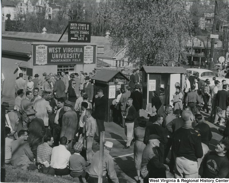 Fans lined up at Mountaineer Field's main entrance, ca. 1956.