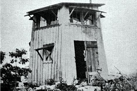 A "Jenny Lind" style fire tower at Signal Knob in Pocahontas County.  A simple wooden structure, where the top floor was used for observation and the bottom for living quarters.