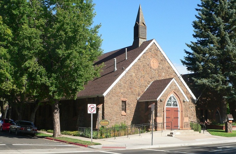 The Flagstaff Christian Fellowship congregation is housed in the historic First Baptist Church, which features a unique volcanic stone exterior.