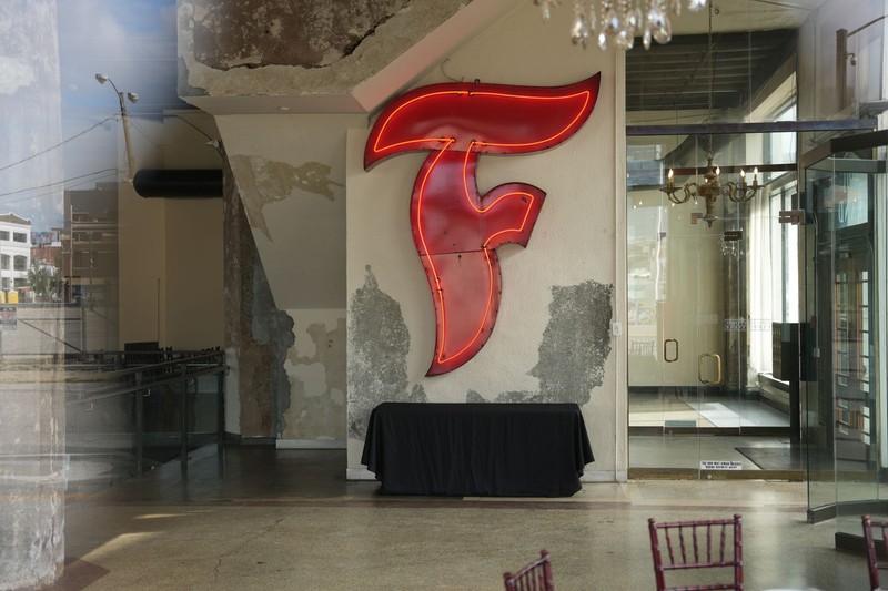 A photo of the Firestone logo inside the building