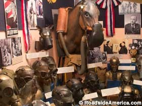 Display of historic gas masks in the Chemical Corps museum