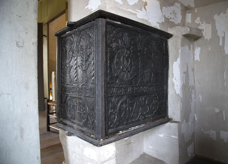 The remaining five-plate stove which, with two others, served to heat the entire home.