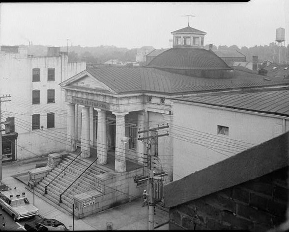 Photo of the Exchange Building serving as the police station in 1959. Photo by HABS.