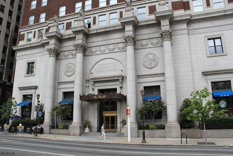 The Arch Street entrance to the building with its Corinthian columns topped by granite eagles.