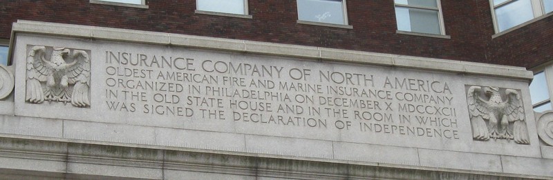The inscription on the building that commemorates the founding of INA.