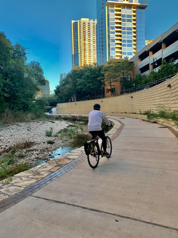 A man biking on the trail. (September 2019)
