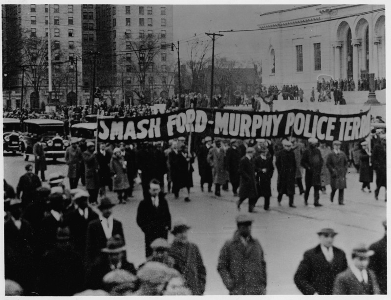 Banner with the slogan of the funeral march held five days later- "Smash Ford-Murphy Police Terror"