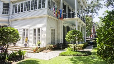 Le Musee also features landscaped grounds as seen in this photo of the rear of the house.