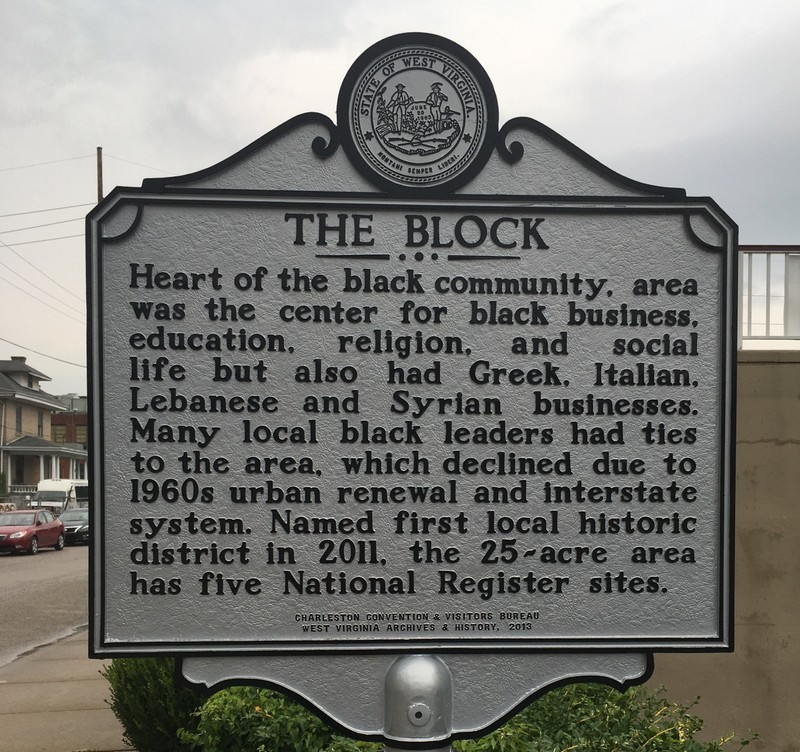 Historical marker placed in 2013 by the WV Center for African American Art & Culture, Inc.  The marker is located in the parking lot of a current Charleston hotel (formerly the site of the segregated Black only Ferguson Hotel). 