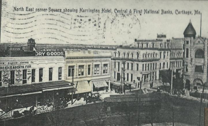 Postcard image of north east corner of square showing Central National Bank building as well as its neighbors to the west (Deutsch Clothing and Whitsett's Dry Goods) and its neighbor to the east  (Harrington Hotel), circa 1906-10.