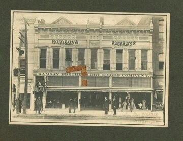 Ramsay's Brothers Dry Goods Company pre-1917 facade of the second Pollard Building. Note, two storefronts have been united into one store.