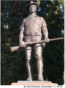 The Hiker, The statue is 9 feet tall and stands on a 6-foot granite base, representing a soldier clad in a period uniform with a campaign hat and a Krag-Jørgensen rifle.