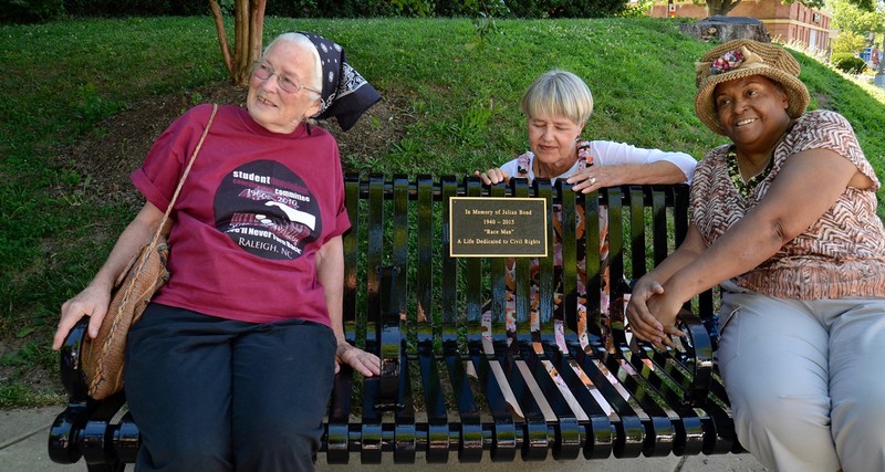 Members of the Student Nonviolent Coordinating Commitee, Joan Mulholland, left, and Joyce Ladner, right, joined Julian Bond's widow, Pam Horowitz, middle, at the dedication of the bench on June 26, 2017.