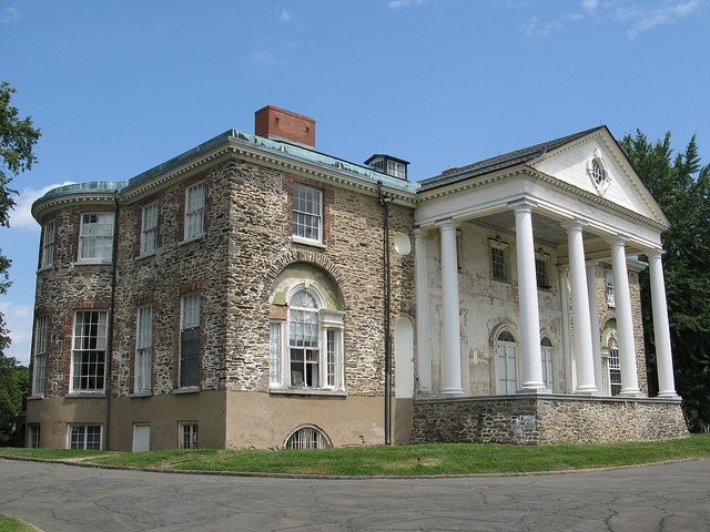 The Woodlands Federal style mansion with its impressive portico.