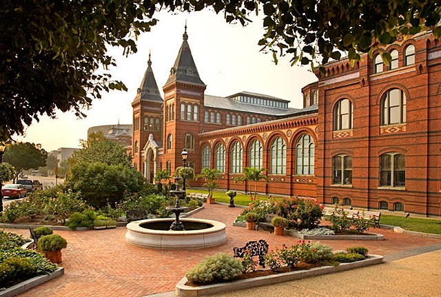 The Arts and Industries Building complements the red brick of the Smithsonian Castle and presents a unique design on the National Mall. Photo courtesy of the Smithsonian Institution. 