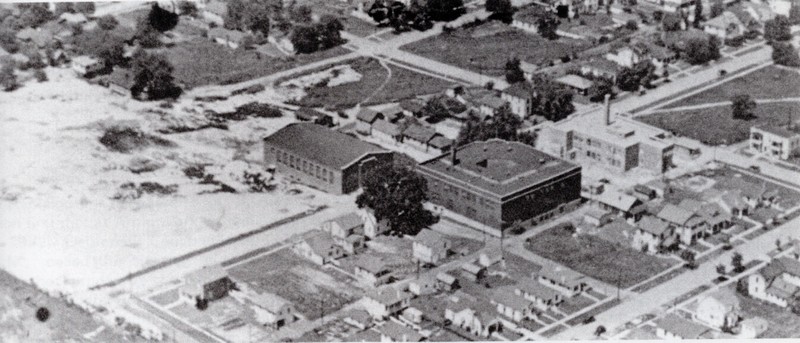 An aerial view of Oakes Field under construction (far left) circa 1941. Note that the Oakes Gymnasium has already been completed (center). 