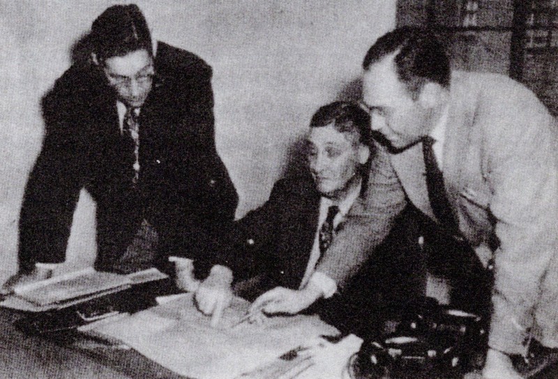 Gus Evans (seated center) with sons Pat (left) and Leslie (right). Along with son Everett and grandson Don, they would run the Evans Lumber Company for 83 years.