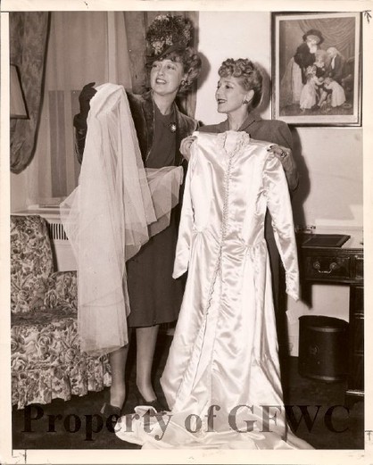 Women's clubs contributed to national efforts during both World Wars in a huge variety of ways, including a drive to donate wedding dresses to newly-married British servicewomen. Here, actress Mary Pickford donates her dress. Courtesy of the GFWC.