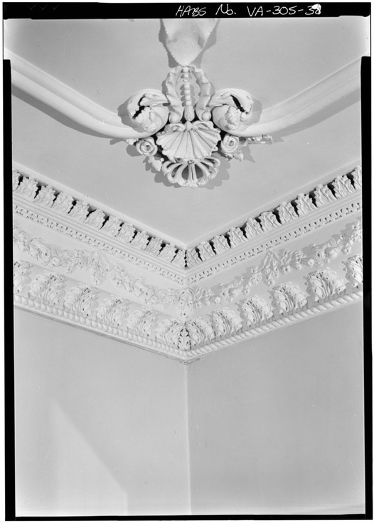 Intricate molding work in the dining room on Kenmore's first floor