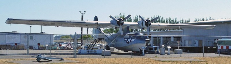 The museum's restored PBY is on display across the street from the museum building.