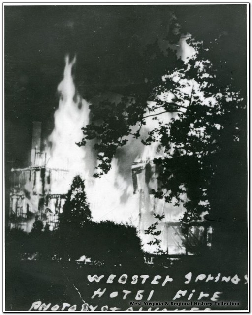 The Webster Springs Hotel as it burns down, engulfed in flames.