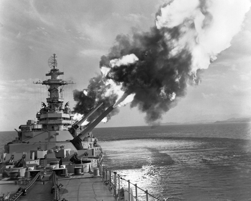 The USS New Jersey launching an artillery bombardment in Korea, 1953. (Wikimedia)