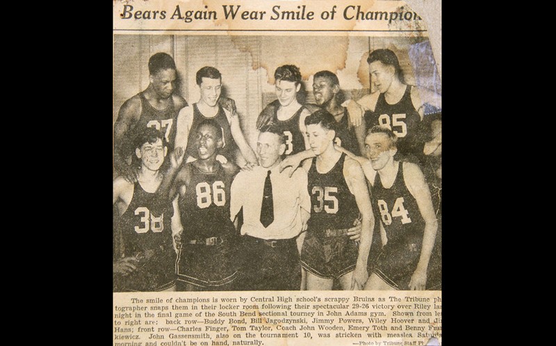 John Wooden with his team after winning a huge game in 1941