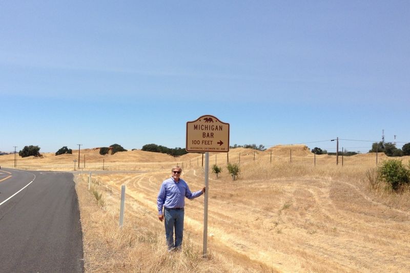 This sign gives notice of the upcoming historic marker at the site of Michigan Bar