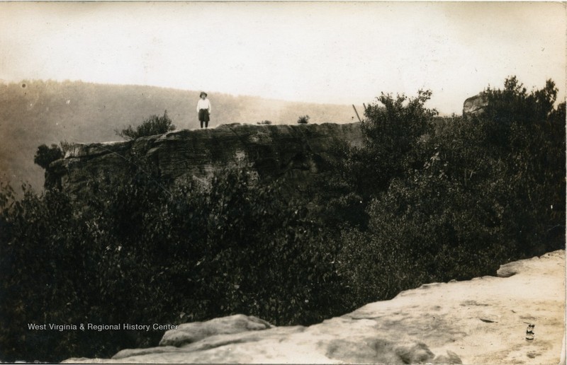 A lone figure standing on the overlook, undated but before 1936