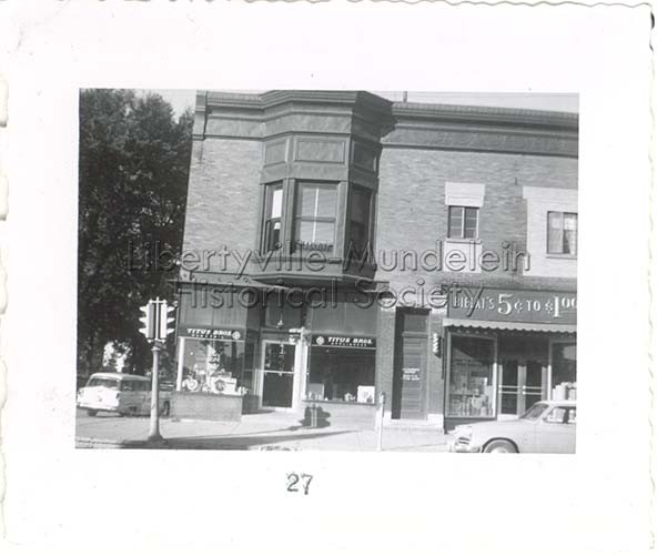 Titus Bros, Bielat's .05 - $1.00 and Scotty's barbershop, 1955