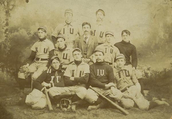 The 1895 Indiana Baseball Team pictured in jerseys with I and U across the chest similar to the sweaters of the university.