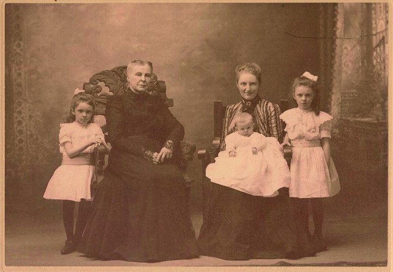 Alice, Martha, Eugenie holding Charlotte, and Isabel