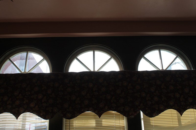 A view of the distinctive semi-circular windows from inside the 2nd floor showroom.