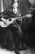 Robert Johnson, posing for picture in late 1920s.