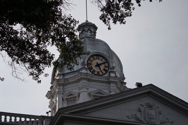 The dramatic three level cupola was designed by H. L. Lewman and built by the Falls City Construction Company.