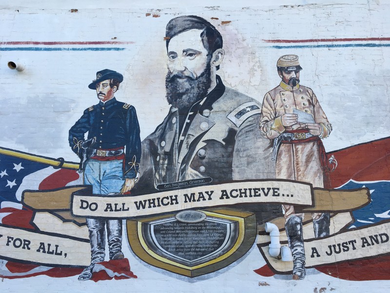 This is a close up of General Benjamin Grierson and a soldier from the Union (left) and the Confederacy (right).