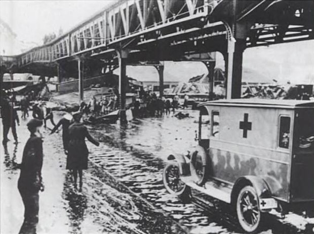 Ambulances rushing to the scene of the explosion through the molasses wreckage. 

Source: http://mentalfloss.com