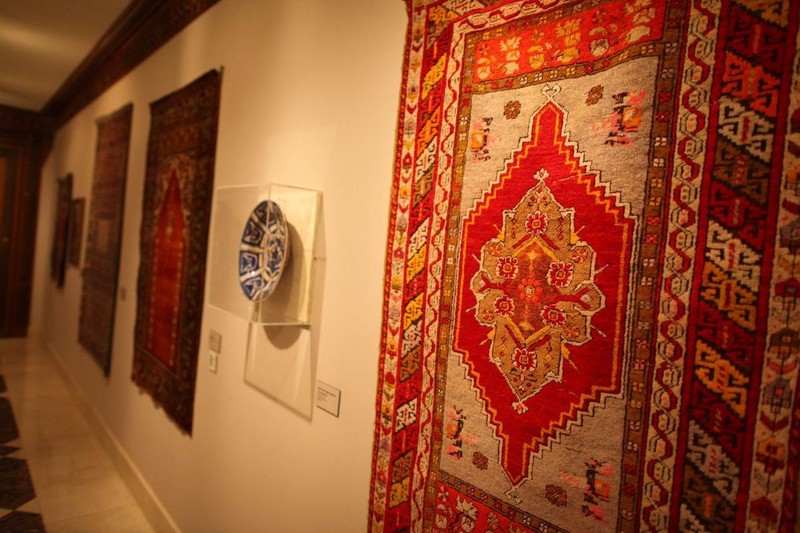 Prayer rugs on display in the gallery