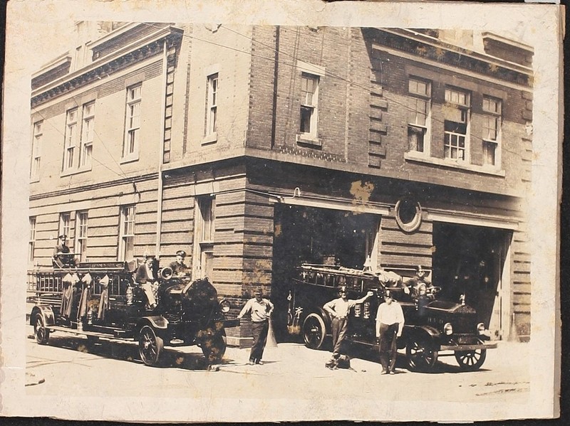 This c.1910 photograph shows the men and equipment of Reily Hose Company #10 outside the fire house.  