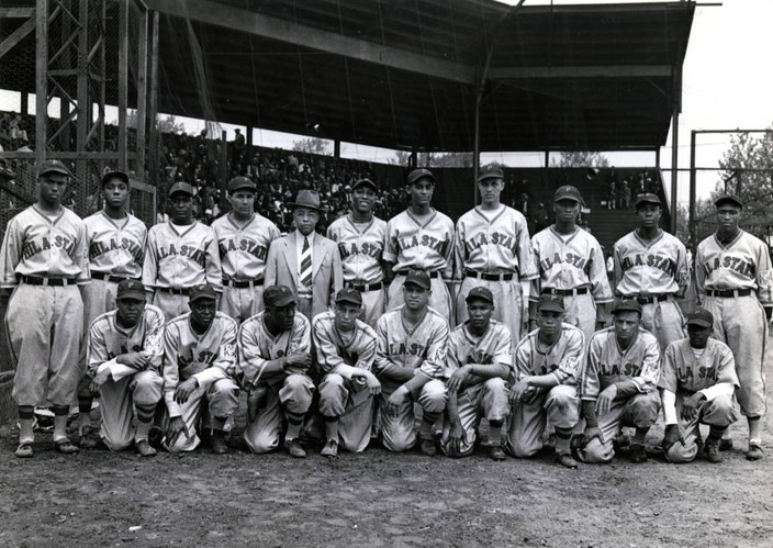 1944 team photo of the Philadelphia Stars. Behind the team is the famous grandstand from which Miss Hattie Williams obtained her firewood