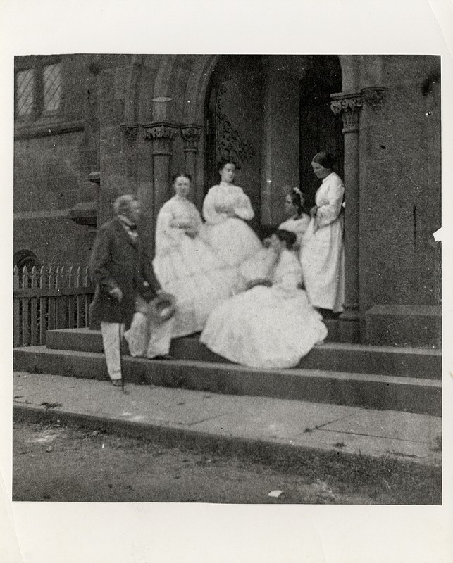 Henry, his wife Harriet, and three of their four children, Caroline, Mary and Helen, standing in the east doorway to the Castle. Courtesy of the Smithsonian Institution Archives. 