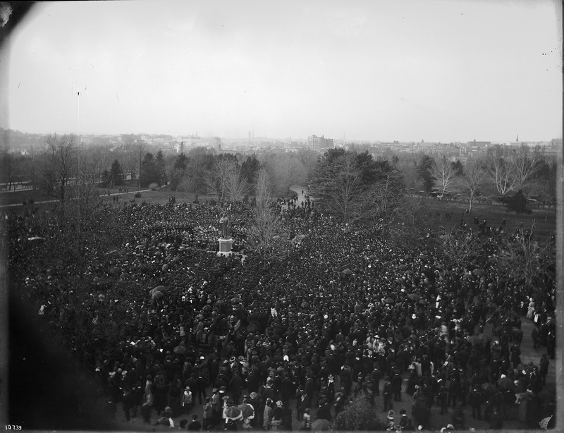 This photo, taken through a window in the Castle, captures the crowds that gathered for the Joseph Henry statue dedication in 1883. Courtesy of the Smithsonian Institution Archives. 