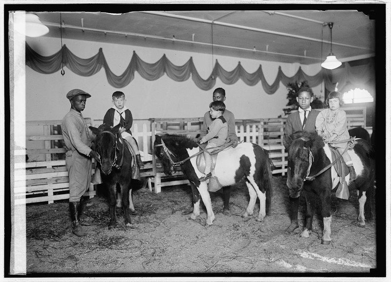 Children both working and playing in the Woodies toy department. Photo, 1924, courtesy of the Library of Congress. 