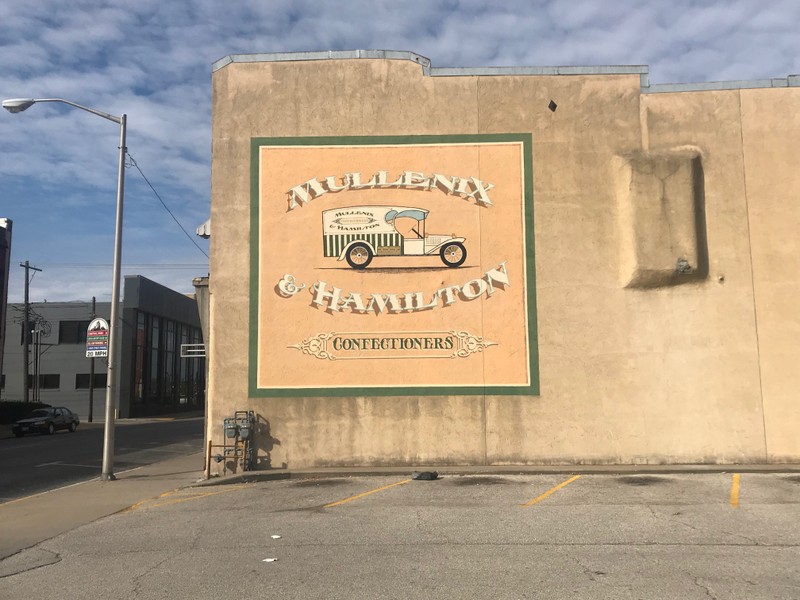 Robert Mullenix and Lloyd Hamilton started their popular confections stands in 1913. They unified the community with sweet treats, and that legacy lives on through Hamilton's Catering Co. The mural was painted by Francisco Vargas in 2006.