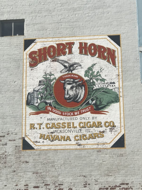 R.T Cassell and his brother, Lyman, began their own cigar-making business in 1882. Their business demonstrates the power and initiative that small business had and continue to have in Jacksonville. This mural was painted by Mike Meyer in 2006.